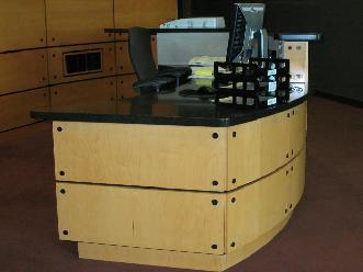 Maple Plywood Radius Reception Desk and Solid Surface Countertops